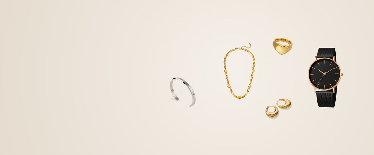 Mirra jewelry and watch flat lay on warm beige